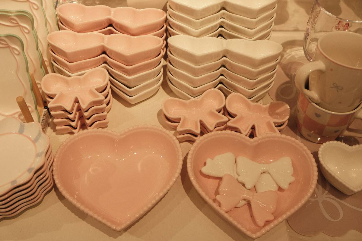 valentine paper plates dollar tree displayed on a rustic wooden table with rose petals and candles